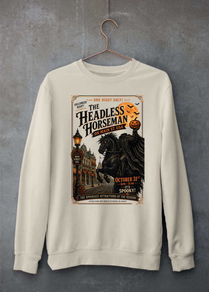 headless horseman inspired sweatshirt. The headless horseman holding a pumpkin whilst riding down main street usa on halloween night