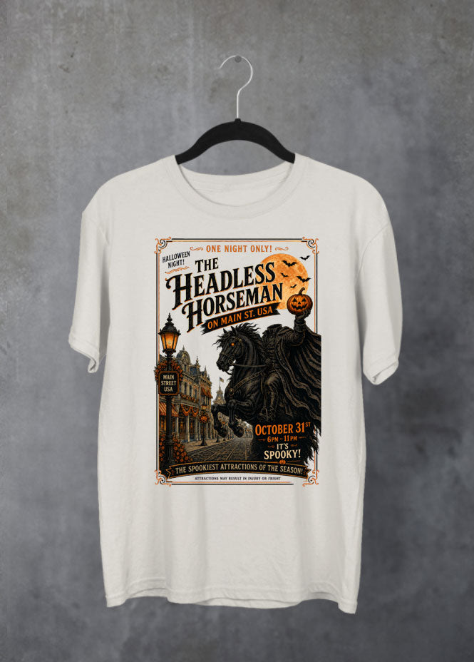 headless horseman inspired sweatshirt. The headless horseman holding a pumpkin whilst riding down main street usa on halloween night